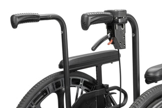 Ki Mobility Catalyst 5 (K0005) Ultra-Lightweight Folding Manuel Wheelchair with handlebars and seat on a white background