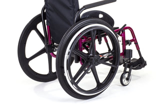 Ki Mobility Catalyst 5 (K0005) Ultra-Lightweight Folding Manuel Wheelchair with black and purple frame on a white background
