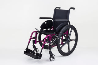 Ki Mobility Catalyst 5 (K0005) Ultra-Lightweight Folding Manuel Wheelchair with purple frame on a white background