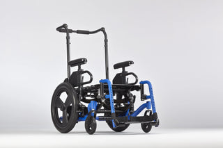 Ki Mobility Focus CR (E1161) Tilt Manual Wheelchair with stand on a light gray background