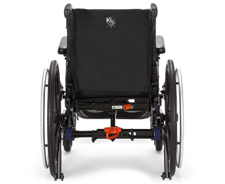 Black Ki Mobility Liberty (E1161) Folding Tilt Wheelchair with visible KI logo on a white background