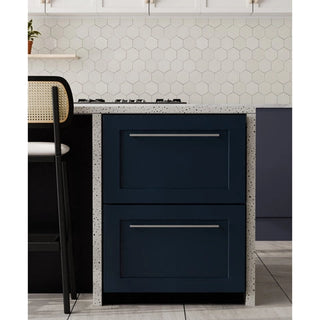 Modern kitchen with navy blue KoolMore KM-BIR2D-PR Panel Ready Drawer Refrigerator and a speckled countertop.