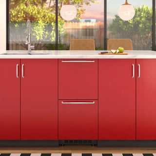 Modern kitchen with red cabinets, white countertop, red KoolMore KM-BIR2D15-PR Panel Ready Built-in Double Refrigerator and outdoor view.
