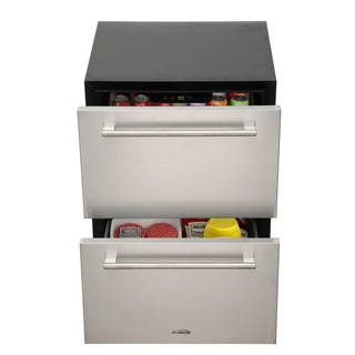 Stainless steel KoolMore KM-OKS-RD2 Built-in Two-Drawer Outdoor Refrigerator with food items on a white background