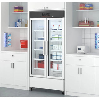 KoolMore KM-PHR-27C Medical Vaccine Refrigerator, 27 cu. ft. in a room with white cabinets and shelves.
