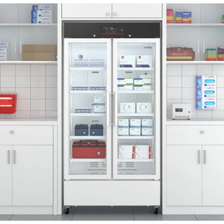 KoolMore KM-PHR-27C Medical Vaccine Refrigerator, 27 cu. ft. in a medical or laboratory setting with shelves and equipment.