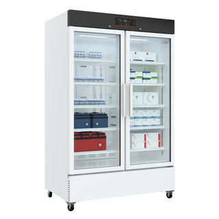 Large white KoolMore KM-PHR-35C Medical Pharmacy Refrigerator, 35 cu. ft. with glass doors displaying medical supplies on a white background