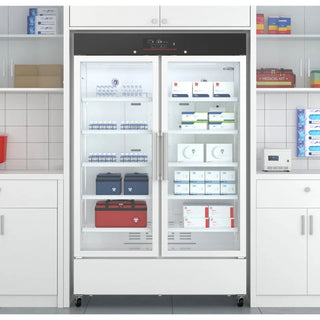 KoolMore KM-PHR-35C Medical Pharmacy Refrigerator, 35 cu. ft. with shelves stocked with medical supplies in a clinical setting