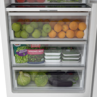 Open KoolMore KM-PRC-R30 Panel Ready Refrigerator Column with fresh produce including apples, oranges, and leafy greens.