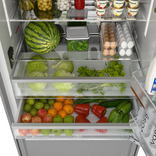Open KoolMore KM-RER36-SWPR Panel Ready Refrigerator/Freezer with Ice Maker with various food items including fruits, vegetables, and dairy products.
