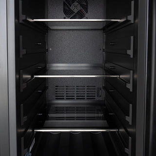 Empty KoolMore KM-BIR15-PR Built-In Panel Ready Undercounter Beverage Refrigerator interior with shelves and lights on