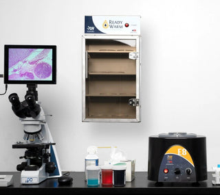 LW Scientific Ready Warm wall incubator mounted above a lab bench next to a microscope and centrifuge