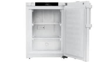 White Liebherr SFTfg 1501 Performance Laboratory Freezer with open door on a white background