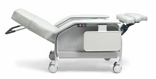 White medical examination table with 'Lumex' branding on a white background