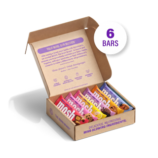 Open MOSH Best Sellers Trial Pack box holding assorted wrapped Snack bars