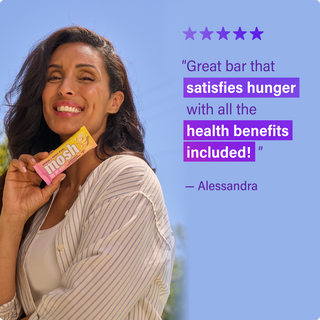 Customer holding a MOSH protein bar next to a written review