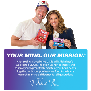 MOSH founders Maria Shriver and Patrick Schwarzenegger holding boxes of MOSH protein bars