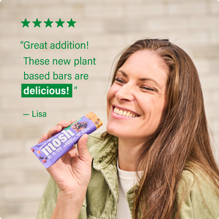 Customer holding a MOSH protein bar next to a written review