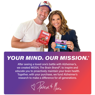 MOSH founders Maria Shriver and Patrick Schwarzenegger holding boxes of MOSH protein bars