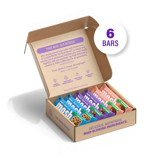 Open MOSH Plant Powered Trial Pack box holding wrapped plant-based bars