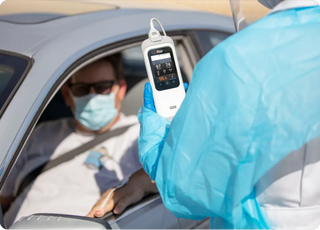 Masimo Rad-G with Temperature Medical Equipment at car testing center for vital signs monitoring