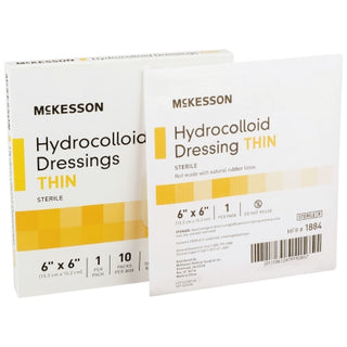 Two McKesson 882983_CS Hydrocolloid Dressing 6 X 6 Inch Square packages on a white background