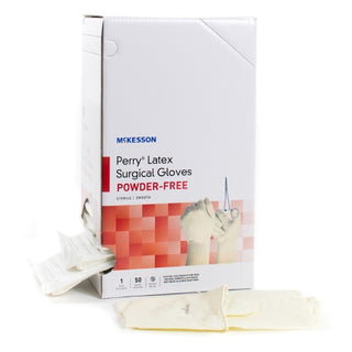 Box of McKesson Perry® 1044707_CS Surgical Glove Performance Plus Size 7.5  Latex Standard Cuff Length on a white background