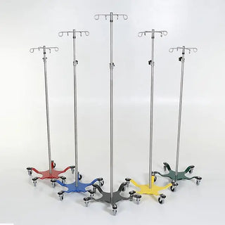 Set of five medical MidCentral Chrome 5-leg Spider IV Pole stands with colorful wheels on a white background