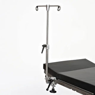 Medical MidCentral MCM-216 Uni-Pole Clamping IV Pole stand attached to a hospital bed on a white background