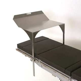 Medical examination table with a MidCentral MCM107 Anesthesia Protection Shield on a white background