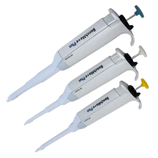 Three laboratory micropipettes with 'OXFORD BenchMark Plus' branding on a white background