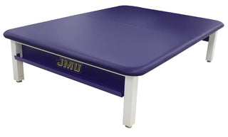 Purple Pivotal Health Aluma Elite Mat Table with white legs and 'JMU' logo on a white background