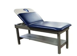 Blue Pivotal Health Edge Sport Wood Treatment Table with a white top on a white background