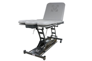 White Pivotal Health PT9060-650 Leg & Shoulder Therapy Table on a white background