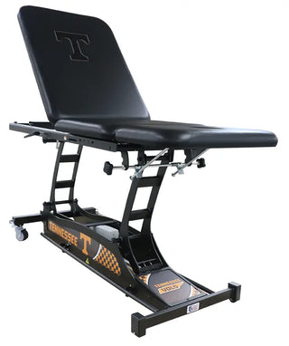 Black adjustable Pivotal Health THERA-P™ Electric Treatment Table with 'Tennessee' branding on a white background