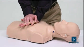 Person performing CPR on a mannequin with a white background