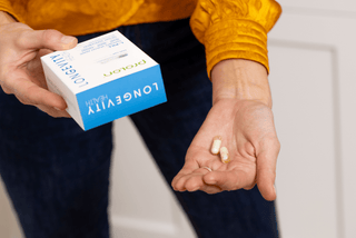 ProLon L-Pill dual-cap design showing timed nutrient release
