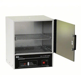 Laboratory incubator with open door on a white background