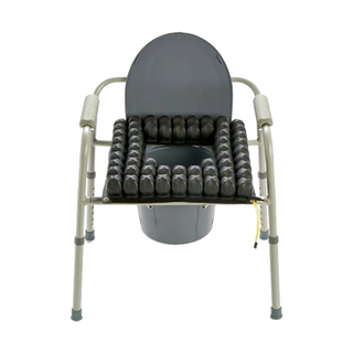 Gray commode chair with ROHO® Shower/Commode Cushion on a white background