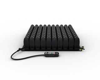 Black ROHO® Single Compartment Sensor Ready Wheelchair Cushion, Mid Profile with control panel on a white background