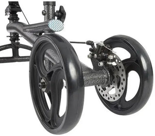 Close-up of Rhythm Healthcare KN1000 Knee Walker wheel with hub and spokes on a white background
