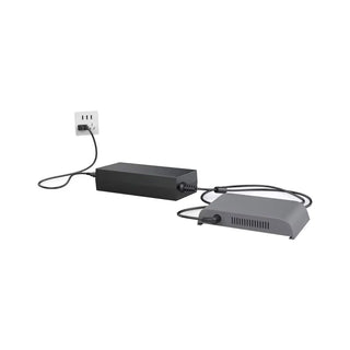 Rhythm Healthcare TOC3 External Battery Charger, AC Power Supply with cables and connectors on a white background