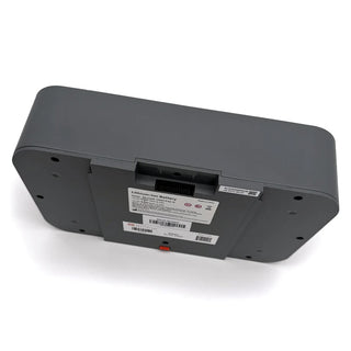 Back view of a Rhythm Healthcare TOCBY-2 Battery for the TOC3 Transportable Oxygen Concentrator with labels on a white background