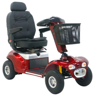 Red mobility scooter with a black seat and basket on a white background