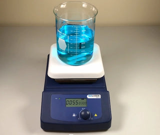 Biologix hot plate with beaker of blue liquid on a neutral background