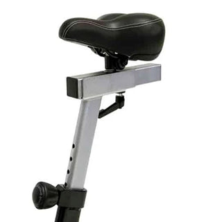 The Stroops AIRBIKE is a commercial fan exercise bike featuring a black steel frame, oversized front air resistance fan, moving upper-body handlebars, adjustable padded seat, foot pedals, and a wireless digital performance display mounted above the fan. Integrated transport wheels allow the bike to be moved easily while maintaining a heavy-duty commercial construction suitable for gyms, rehabilitation clinics, and performance training facilities.