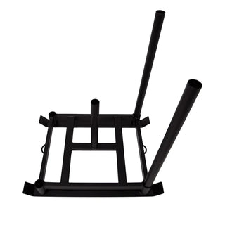 The Stroops BASE SLED is a rugged low-profile steel push sled with detachable upright push handles, a central base ring for adding weight plates, and steel rings on both sides for attaching a rope or battle rope for pushing and pulling exercises.