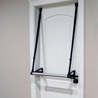The Stroops DORBARRE is a compact portable aluminum barre secured to a standard doorframe with synthetic brackets and adjustable straps. The barre has supports at four ends and can be positioned at different heights for home ballet, barre, yoga, and Pilates exercises.