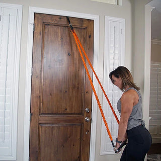 The Stroops FITSTIK Fit Stik Bar is a compact aluminum training bar with a slim cylindrical design, comfortable anti-slip handling, and swivel eyelets at the ends for attaching resistance bands or cable machine connections. Its compact size is suitable for portable full-body resistance training.