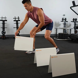 White Stroops agility hurdles made from durable whiteboard-like material, designed for speed and agility drills, workout space marking, and circuit training.